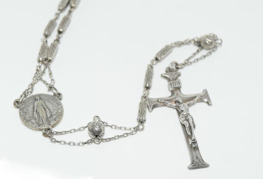 Z Sterling Silver Beaded Rosary: This Sterling Silver Rosary has a 43 x 23mm Cross on 35inch beaded chain with an 8inch drop stamped Z Sterling and weighs 30.22 grams.