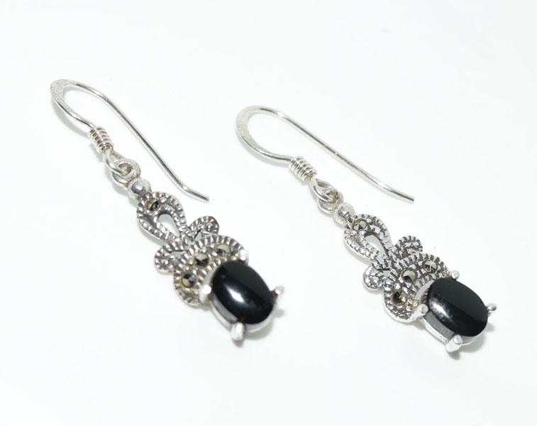 VTG Silver Marcasite Onyx Earrings: These Vintage Sterling Silver & Marcasite hook Earrings measure 7.6mm wide with a 34.7mm drop with 6.6 x 4.6mm onyx prong set Stones.