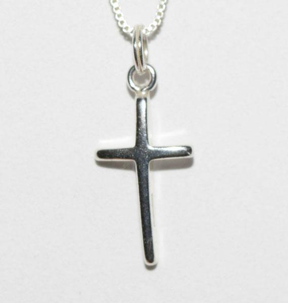 Sterling Silver Simple Cross Necklace: This Sterling Silver Simple Cross Pendant measures 9.5mm wide with a 22.50 mm Drop on a 18inch box chain and is stamped 925 IN.