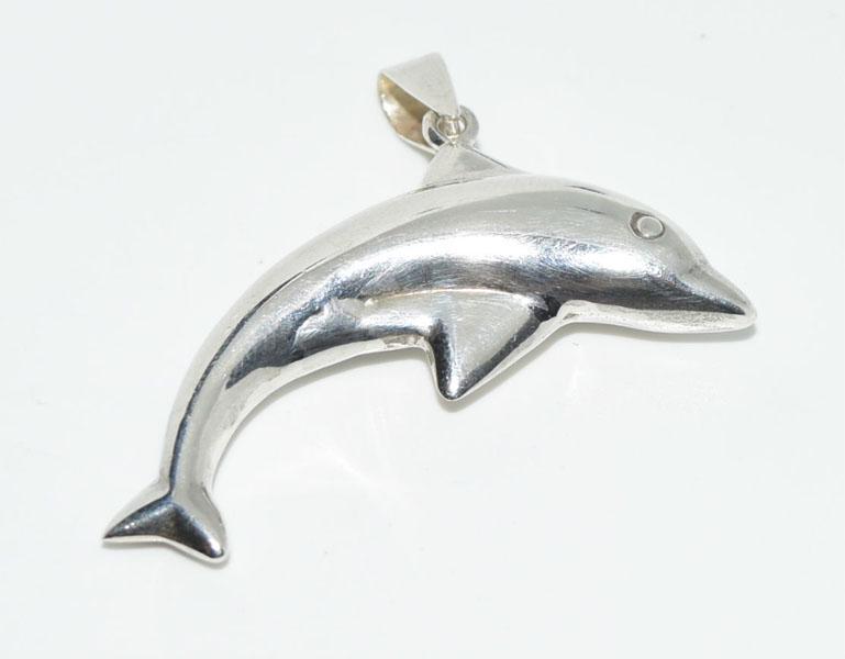Sterling Silver Dolphin Pendant: This Pendant measures 39.5mm wide with a 40mm drop.