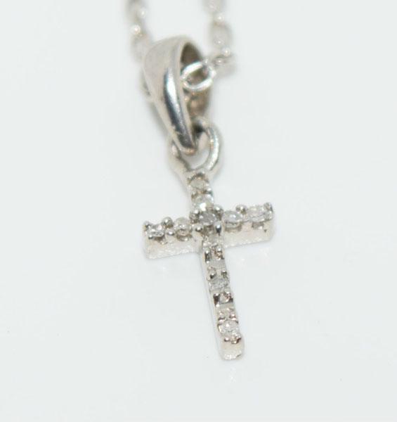 Dainty Sterling Diamond Cross Necklace: This Sterling silver clamp beaded chain is 18inchs and has a 5.5mm wide with a 15mm drop cross pendant with diamonds. The Pendant is also stamped JW BR.