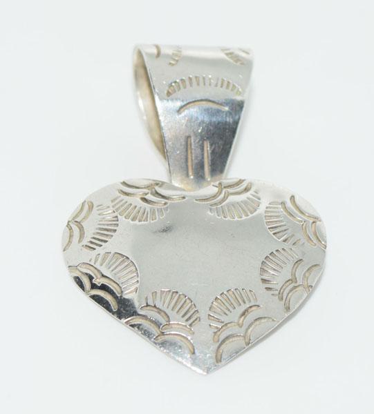 Taxco Mexico Sterling Etched Heart Pendant: This Pendant measures 23mm x 47mm. Weighs 9.1 grams and is stamped TA 201 Mexico.
