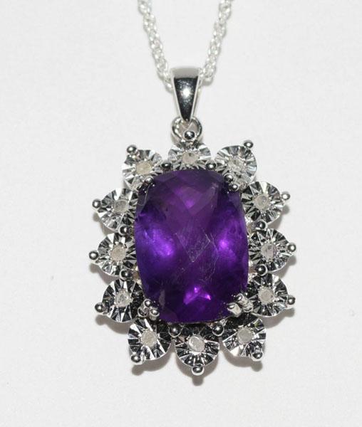 Sterling 5.5ct Faceted Cut Amethyst Necklace: This Sterling silver 19mm wide with a 29.5mm drop Pendant has an oval faceted cut 5.5ct amethyst stone with diamond accents on a 17inch chain.