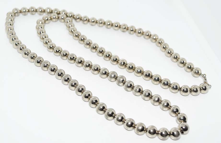 Silver Tone Beaded Necklace: Silver tone beaded necklace | Measurement: 30” length, 8mm width