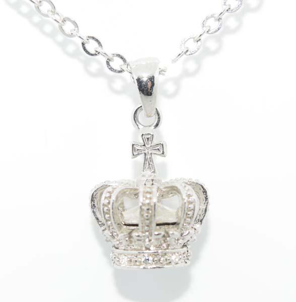 Silver Tone Crown Necklace: Silver tone crown with rhinestone center pendant necklace | Measurement: 15” â€“ 17” length, 30mm pendant drop, 17mm width