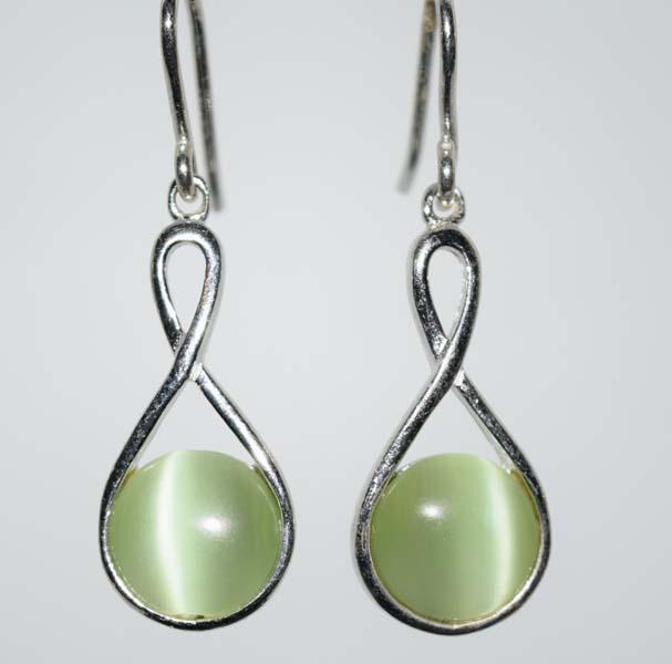 Sterling Green Catâ€™s Eye Earrings: Sterling silver green catâ€™s eye dangle earrings | Measurement: 30.5mm drop, 9.6mm width