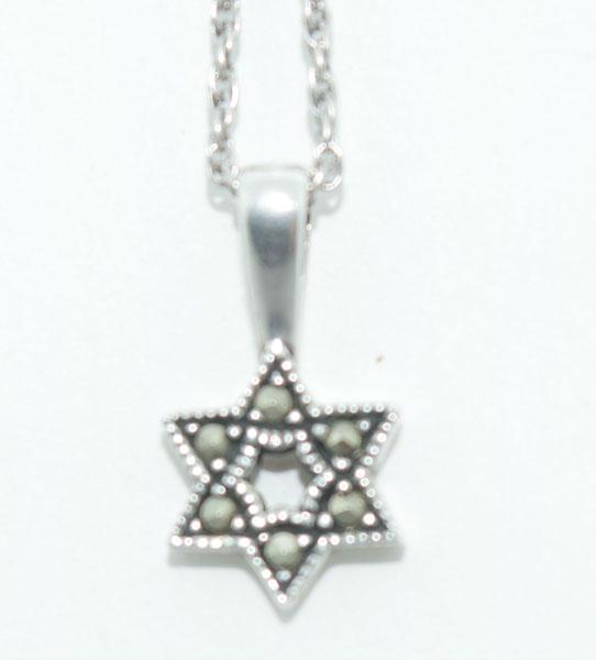 Sterling Marcasite Star of David Necklace: This Pendant measures 8.8 x 16mm on a 17inch chain & stamped Sterling JJ.