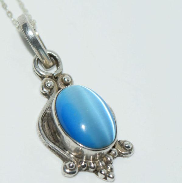 Sterling Silver Blue Cats Eye Necklace: This pendant measures 15.2mm wide with a 37mm drop on a 16.5inches long chain.
