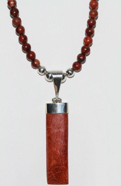 Sterling & Red Coral Beaded Necklace: This Drop Coral pendant measures 12mm wide with a 62.4mm drop on a 17inch coral beaded chain & is stamped 925.