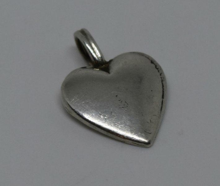 Sterling Silver Small Heart Pendant: This pendant measures 16 x 11.2mm & is stamped IFS Ster.
