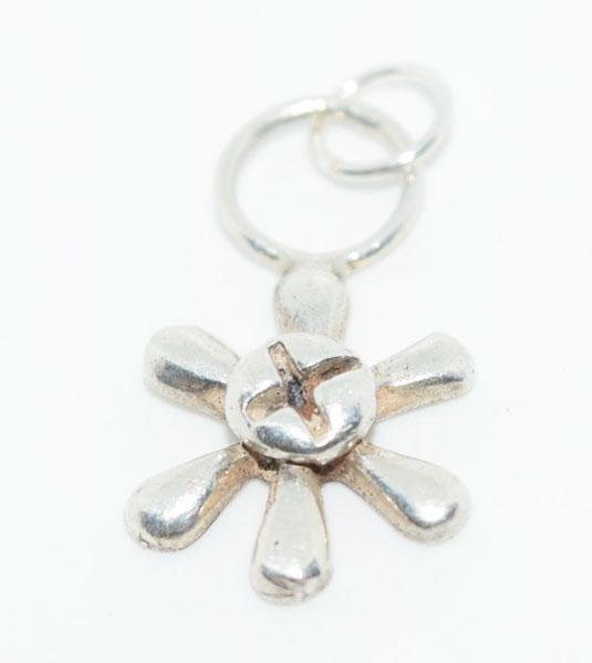 Sterling Silver Flower Charm: This charm measures 23 12.5mm & is stamped 925.