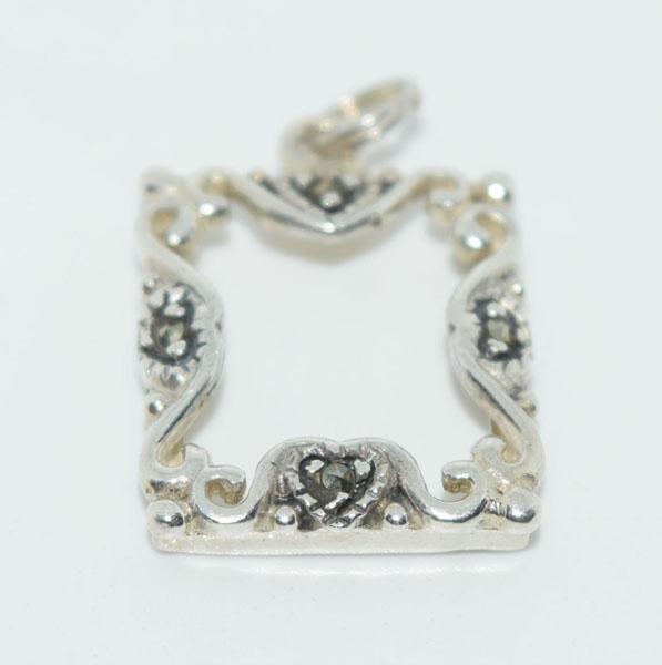 Sterling Silver Marcasite Frame Charm: This charm measures 19.7 x 14mm & is stamped 925 SU.