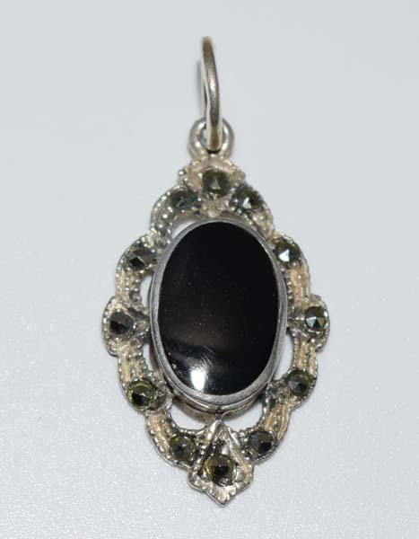 Sterling Marcasite & Onyx Pendant: Sterling silver marcasite and onyx pendant