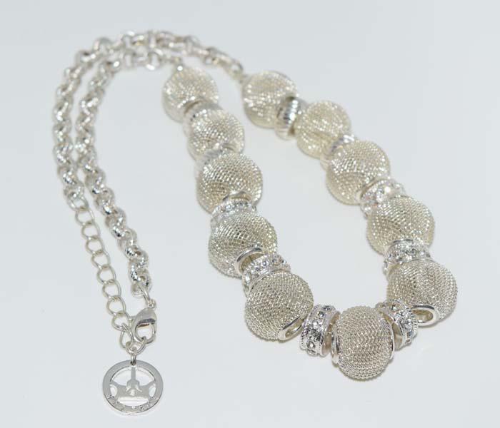 Trifari Mesh & Rhinestone Necklace: Trifari mesh and rhinestone necklace | Measurement: 16.5” – 18.5” length, 16mm width