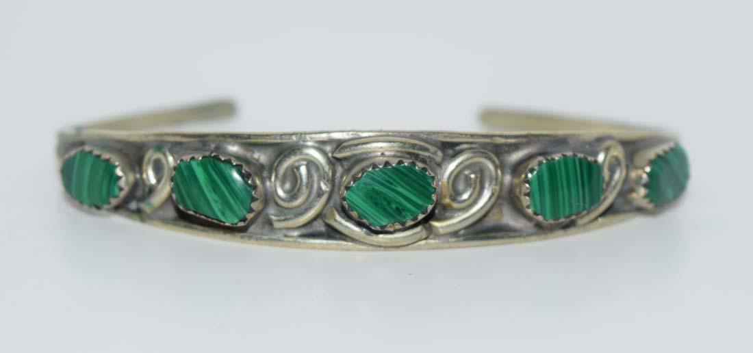 Silver Tone Malachite Cuff Bracelet: Silver tone malachite cuff bracelet | Measurement: 2.4” diameter, 1” opening, 11.5mm width