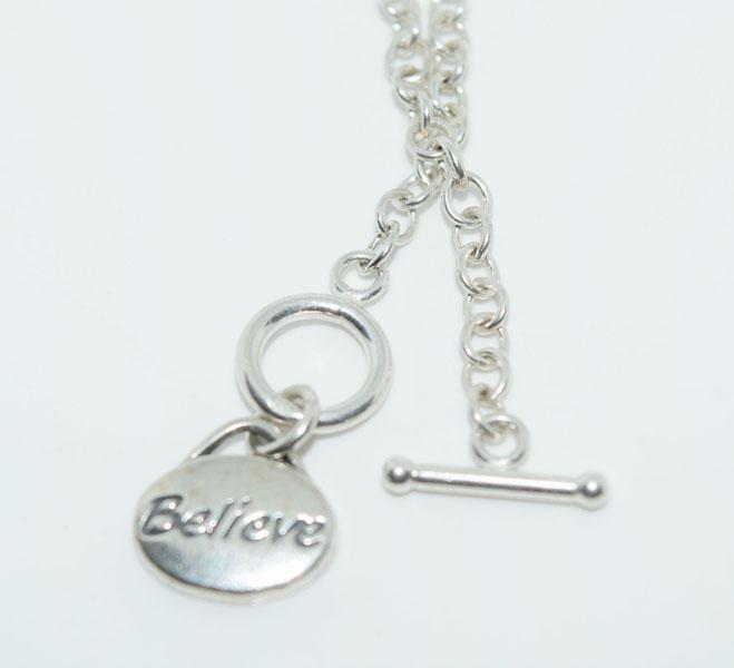 Sterling Silver Believe Charm Bracelet: This bracelet measures 3mm wide Believe charm on a 7.5inch link chain & stamped 925 SJC.