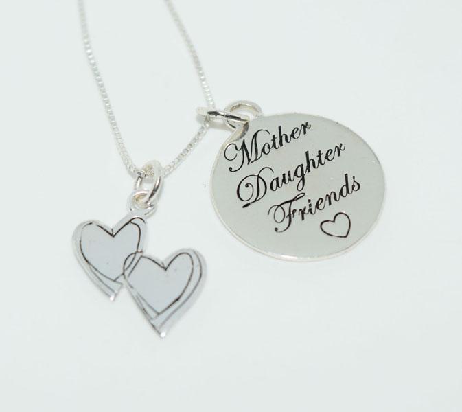 Sterling Silver Mother Daughter Heart Necklace: This circle charm measures 21.2 x 17.9mm, the hearts 16.9 x 12.5mm & stamped 925.
