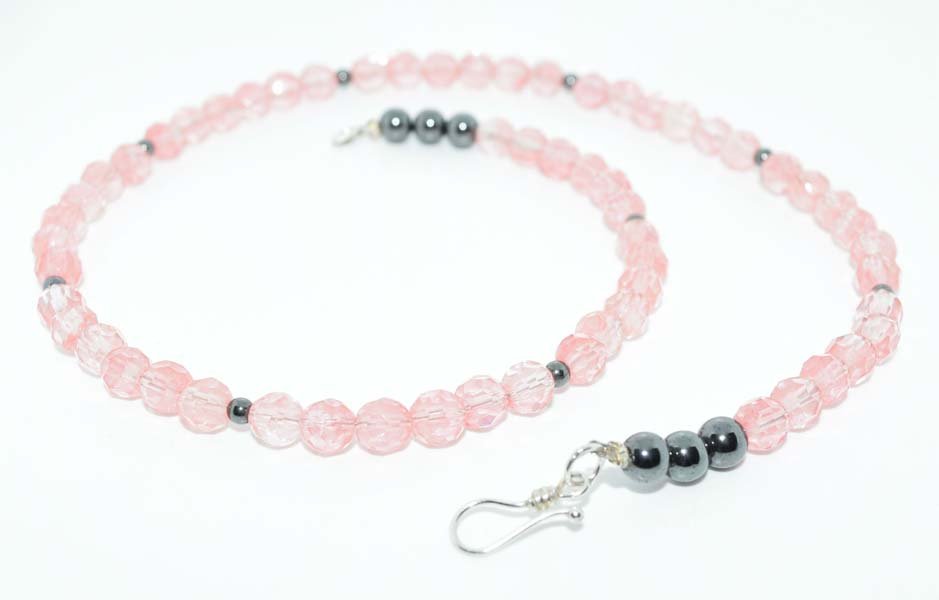 Sterling Hematite Pink Beaded Necklace: This necklace measures 6mm beads 17inches long with sterling 925 hook closure.