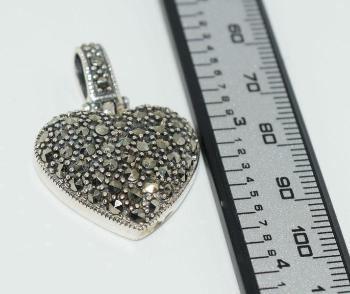 Sterling Silver Marcasite Hinged Heart Pendant: This pendant measure’s 33.5 x 23.5mm weighs 7.36grams & stamped 925.