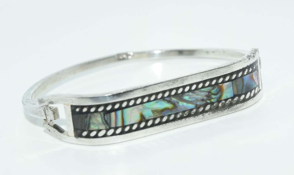 Alpaca Abalone Inlaided Hinged Bracelet: This bracelet measures 11.5mm wide with a 2.25inch diameter weighs 16.05grams.