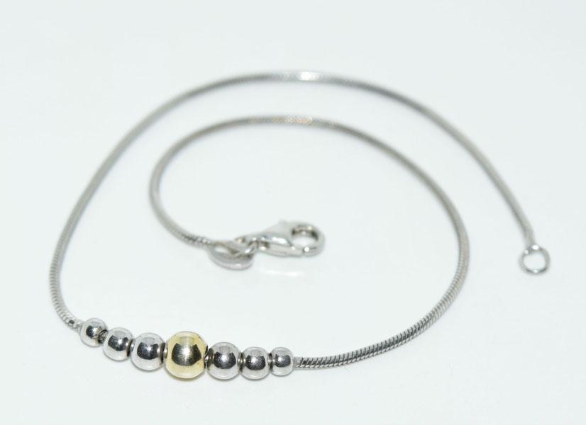 Sterling Silver Ball Beaded Ankle Bracelet: This anklet measures 8mm widest ball bead & is 9.75inchs long snake chain & stamped 925 unknown makers mark.