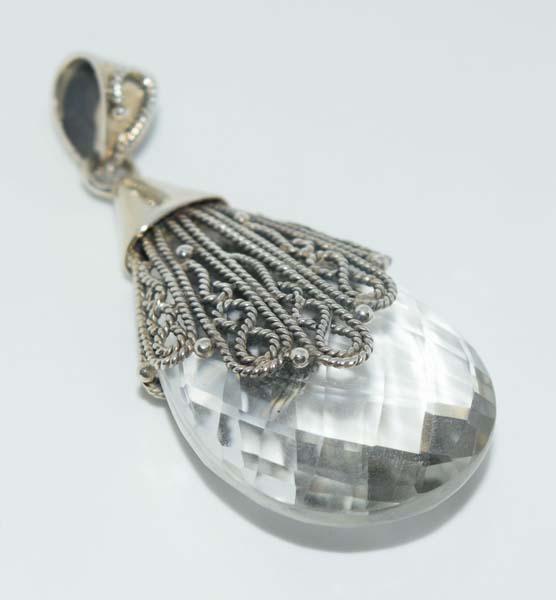 India Sterling Faceted Spinel Pendant: This pendant measures 26.5mm wide with a 2.07inch drop & stamped India DP 925.