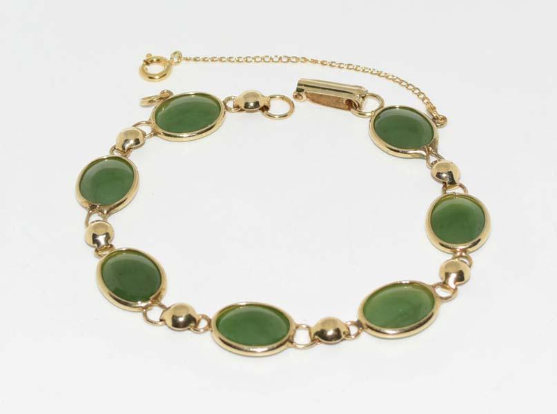 Sorrento 12K Filled Oval Jade Link Bracelet: This bracelet measures 10mm wide 7.5inch with 1inch safety chain weigh s9.4grams & stamped 1/20 12K GF Sorrento.
