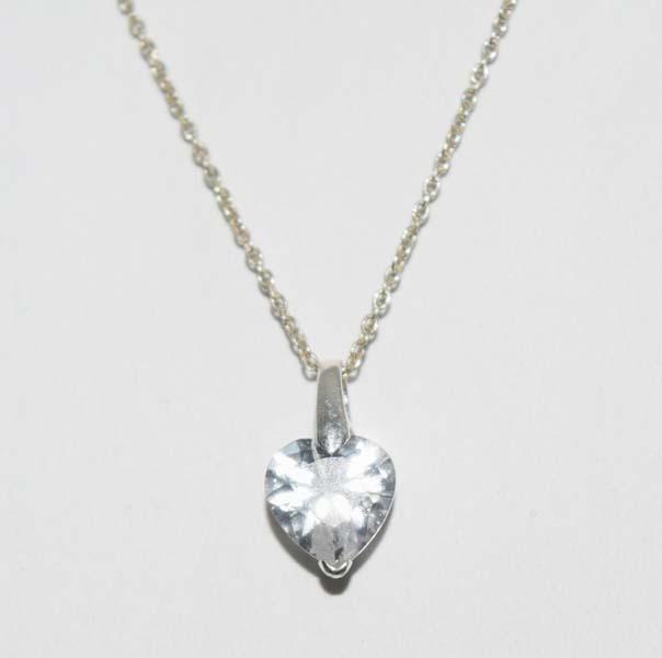 Simple Sterling Silver Heart Necklace: This piece comes on an 18-inch sterling chain. The pendant has a 13.7mm drop and is 8mm wide. Stamped and tested to be sterling silver.