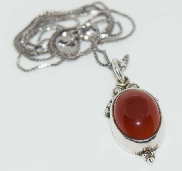 Tested Sterling Cabochon Carnelian Necklace: This pendant measures 24 x 11mm on an 18inch box chain & tested Sterling.