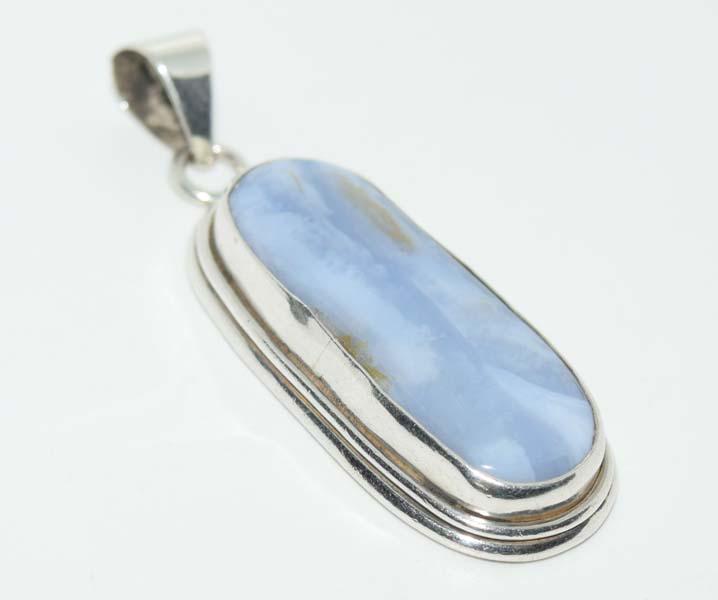 Tested Sterling Wrapped Chalcedony Pendant: This pendant measure 12.2mm wide with a 60mm drop with a chalcedony natural stone & tested sterling.