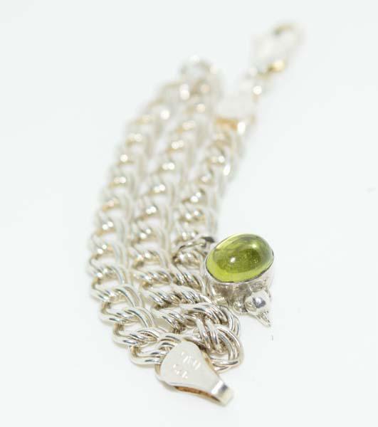 Sterling Peridot Charm Bracelet: This charm measures 4.8mm wide 7inches long & stamped 925 Italy AGI.