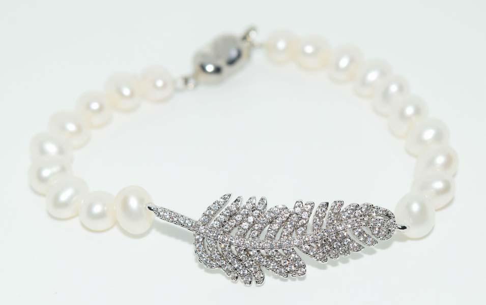 Rhinestone Feather Genuine Pear Bracelet: This bracelet measures 14mm at widest & 7inches long & stamped KHAI.