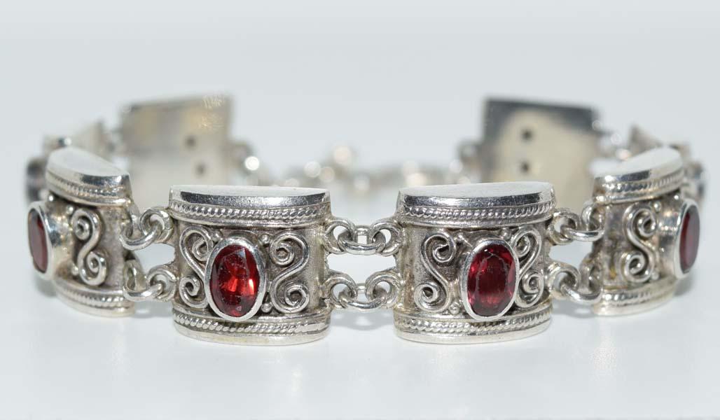 Sterling Silver Garnet Bali Style Toggle Bracelet: Measurement: 7.25 inch length, 12mm width | Note: there are some scrates on the garnet stones | Weight: 21.4 grams | Stamp: 925