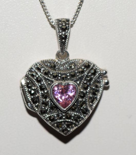 Sterling Silver Marcasite Heart Necklace: This pendant measures 21.5mm wide with a 28.2mm drop on a 20inch box chain & stamped MM 925.