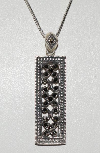 Sterling Silver Cut out Marcasite Necklace: This pendant measures 11.5mm wide with a 41mm drop on an 18.5inch box chain & stamped 925 THNS.