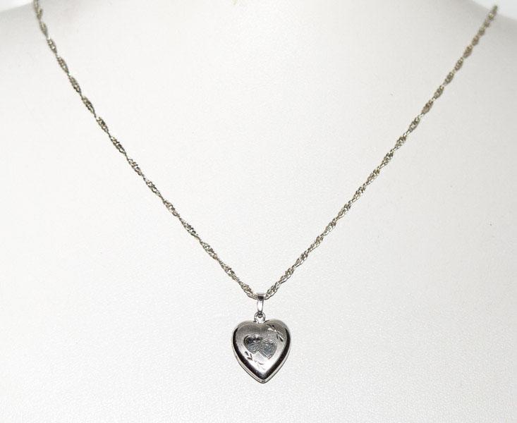 Sterling Small Heart Etched Locket Necklace: Weighs 4.2grams Measures 12.9m wide 19.5mm drop 21inch chain Stamped 925/Sterling KA1772