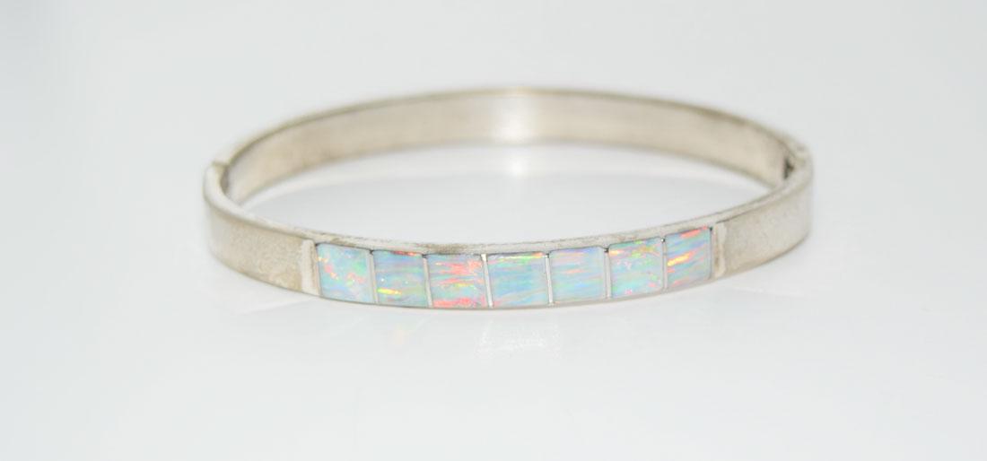 Mexico Silver Plated Opal Inlaid Hinged Bangle: Weighs 25.3grams measures 6.80mm wide 2.48inch Diameter Tested Silver Plated
