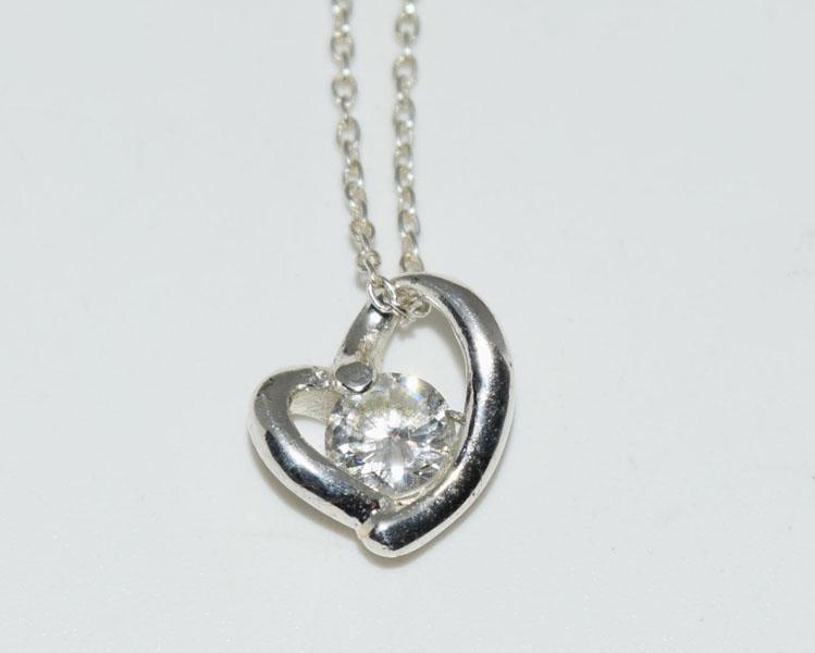 Sterling Sweet Heart Necklace: Weighs 2grams Measures approx. 10mm x 11mm 16inch chain Stamped 925 LA