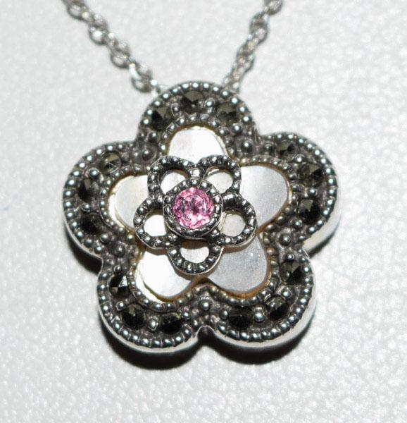 Sterling Marcasite Mother of Pearl Flower Necklace: Weighs 4.9grams Measures approx. 15.5mm round 16inch chain Stamped Sterling JJ