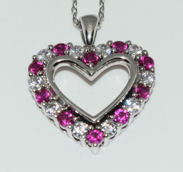 Sterling Ruby & CZ Heart Necklace: Weighs 4.4grams Measures 20.3mm wide 24.7mm drop 21inch chain Stamped JH 925