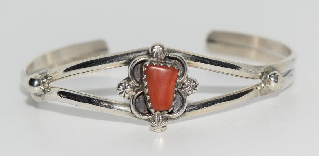 Coral Sterling Split Band Cuff Bracelet: Weighs 9.4grams Measures 15.7mm face Adjustable Stamped Silver