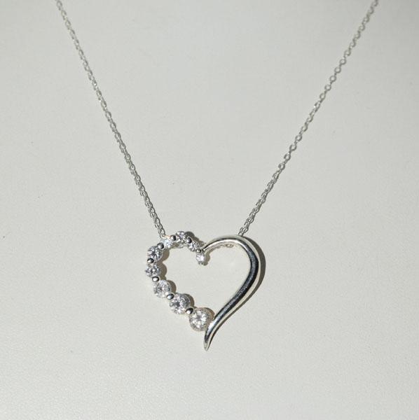 Sterling Silver Journey Heart Necklace: Weighs 3grams Measures 22.3mm wide 22.4mm drop 19inch chain Stamped 925