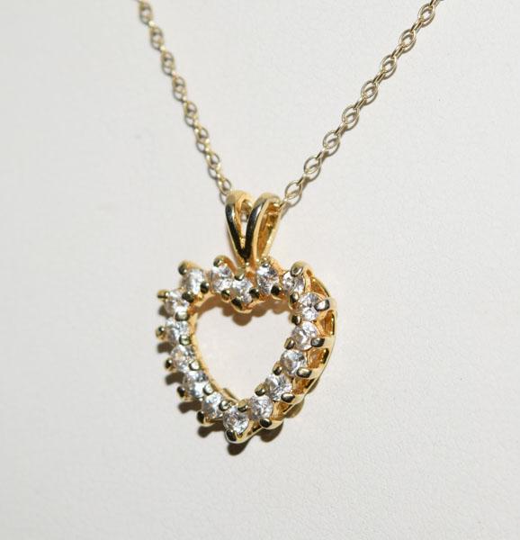 Gold over Sterling Sparkling Heart Necklace: Weighs 2.53grams Measures 15.1 x 19.7mm 18inch chain Stamped 925 PPC