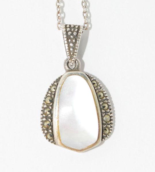 Sterling Marcasite Mother of Pearl Necklace: Weighs 3grams Measures 13.5mm wide 24mm drop 18inch chain Stamped 925 Marsala manuf.