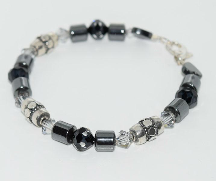 Sterling Hematite Beaded Dolphin Closure Bracelet: Weighs 20.5grams measures 7.6mm wide 8inches long Stamped 925 Dolphin Closure