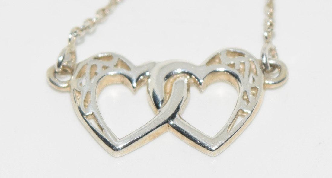 Sterling Double Heart 18inch Necklace: Weighs 3.4grams Measures 12 x 23.5mm 18inches long Stamped 925