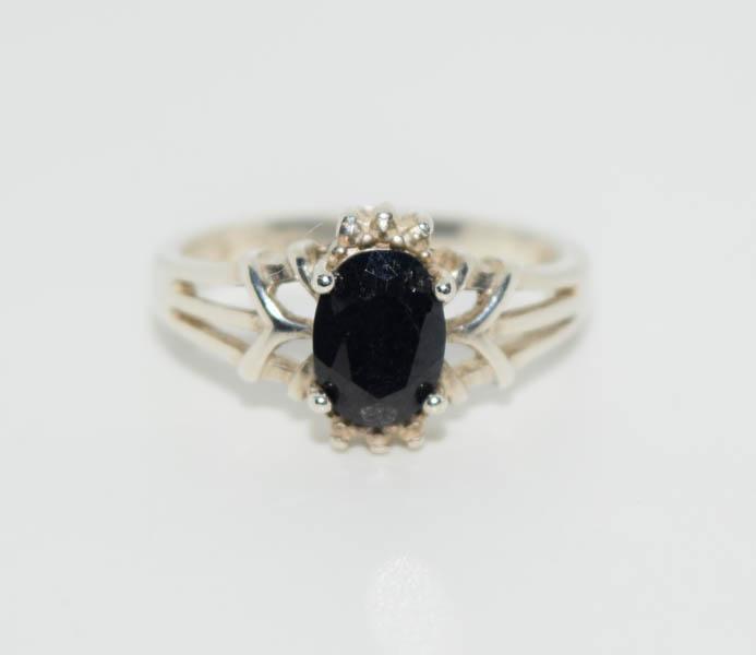 Sterling Sapphire Split Band Ring Sz5: Weighs 2grams measures 9.9mm face size 5 Stamped 925 NVC Tested Sapphire