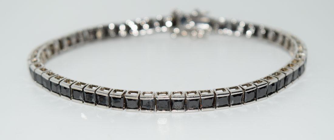 Sterling Silver Navy 7inch Tennis Bracelet: Weighs 11.15grams Measures 4mm wide 7inches long Stamped FI 925 1160