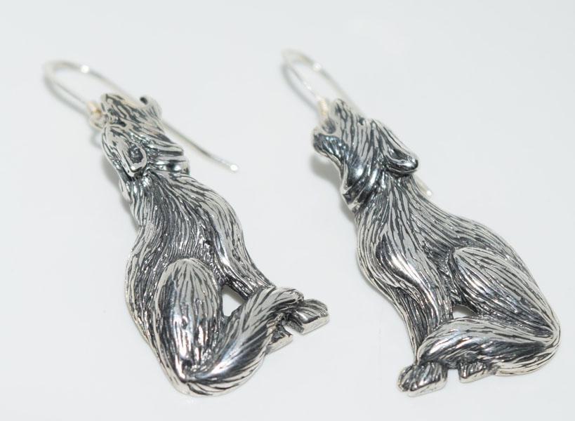 Sterling Howling Wolf Dangle Earrings: Weighs 6.9grams measures approx. 15mm wide 40mm drop Stamped SS Sterling
