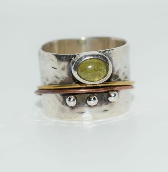 Sterling Peridot Wide Band Artisan Ring Sz8: Weighs 10.2grams Measures approx. 15mm wide Band Size 8 Stamped 925 BOL Tested Peridot